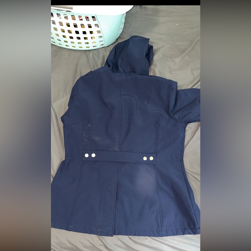 Tommy Hilfiger coat has a little bit of dust and stuff from moving storage